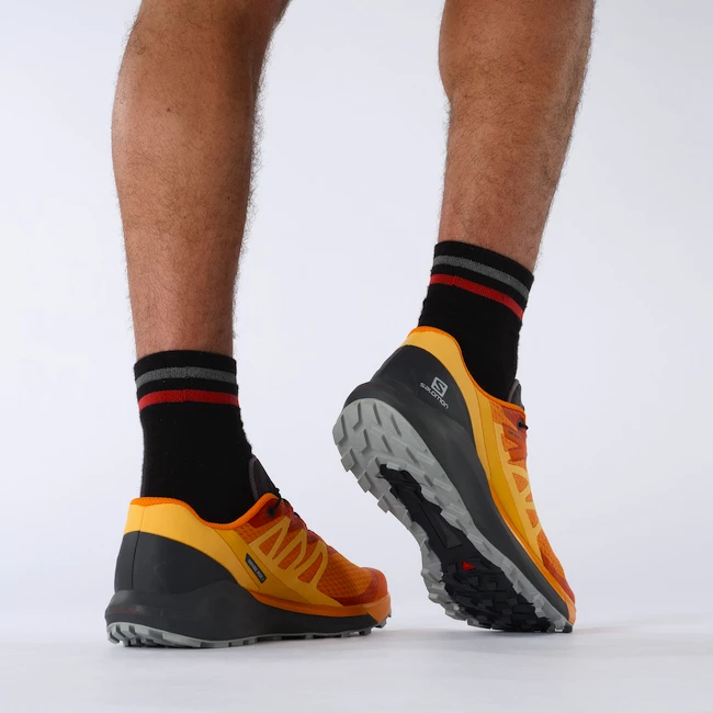 Heren hardloopschoenen Salomon Sense Ride Sense Ride 4 Vibrant Orange / Ebony